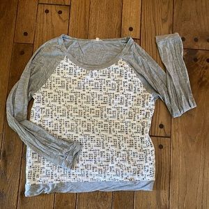 Gray with white lace like material.